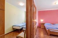 A bed or beds in a room at Chalet Meridiana Appartamento 8