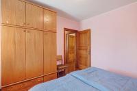 A bed or beds in a room at Chalet Meridiana Appartamento 8