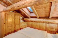 Posteľ alebo postele v izbe v ubytovaní Chalet Meridiana Appartamento 11