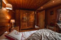 Katil atau katil-katil dalam bilik di Les Chalets de la Serraz