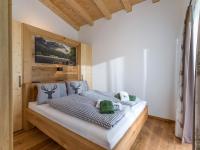Łóżko lub łóżka w pokoju w obiekcie Ferienhaus zur Biene