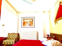 Posteľ alebo postele v izbe v ubytovaní delphi aiolos center hotel panoramic view&yoga harmony hotel&rooms