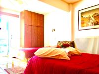 Posteľ alebo postele v izbe v ubytovaní delphi aiolos center hotel panoramic view&yoga harmony hotel&rooms