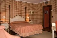 Postel nebo postele na pokoji v ubytování Hotel Presa