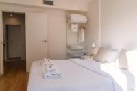 Posteľ alebo postele v izbe v ubytovaní Vibe Apartments by Olala Homes