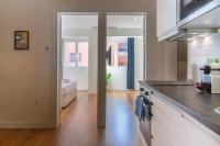 Kuchyňa alebo kuchynka v ubytovaní Vibe Apartments by Olala Homes