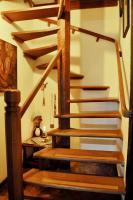 a staircase in a house with wooden steps at Pousada Arte Urquijo in Paraty