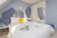 Postel nebo postele na pokoji v ubytování Platinum Tartaczna Apartments by Noclegi Renters