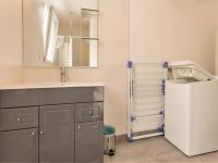 a bathroom with a sink and a mirror at Gîte La Plaine-sur-Mer, 2 pièces, 4 personnes - FR-1-306-1062 in La Plaine-sur-Mer