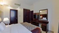 Postel nebo postele na pokoji v ubytování City Stay Residences - Serviced Apartments Al Barsha