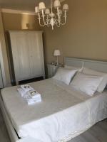 Posteľ alebo postele v izbe v ubytovaní B&B Da Patty