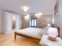 Postel nebo postele na pokoji v ubytování Holiday Home Ivanka by Interhome