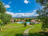 A garden outside Apartment Michelangelo by Interhome