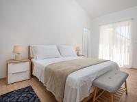 Łóżko lub łóżka w pokoju w obiekcie Villa Flori by Interhome