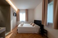 Posteľ alebo postele v izbe v ubytovaní Le Makè bed & breakfast