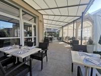 Restaurace v ubytování Hôtel de La Poste