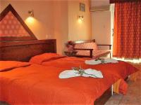 Posteľ alebo postele v izbe v ubytovaní delphi aiolos center hotel panoramic view&yoga harmony hotel&rooms