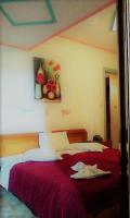 Posteľ alebo postele v izbe v ubytovaní delphi aiolos center hotel panoramic view&yoga harmony hotel&rooms