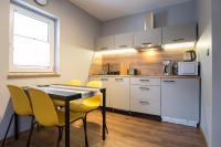 Kuchyňa alebo kuchynka v ubytovaní Apartament Henrykówka Apartzakop