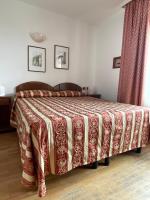 Łóżko lub łóżka w pokoju w obiekcie HG Hotel Italia
