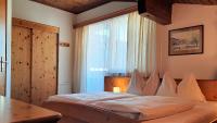 A bed or beds in a room at Haus Elfi