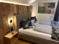 Posteľ alebo postele v izbe v ubytovaní Chalet Apart Hansler