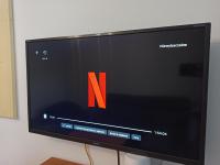 Televízia a/alebo spoločenská miestnosť v ubytovaní Apartament przy Stoku