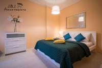 Posteľ alebo postele v izbe v ubytovaní J&J Apartments - Szeroka 25, Apartament 5B