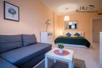 Posteľ alebo postele v izbe v ubytovaní J&J Apartments - Szeroka 25, Apartament 5B
