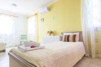 Posteľ alebo postele v izbe v ubytovaní Vista Mare Isavros
