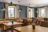 Posedenie v ubytovaní Landhaus Hubertus Wellness & Breakfast
