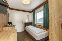 Posteľ alebo postele v izbe v ubytovaní Landhaus Hubertus Wellness & Breakfast