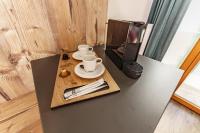 Príslušenstvo na prípravu kávy alebo čaju v ubytovaní Landhaus Hubertus Wellness & Breakfast