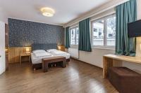 Posteľ alebo postele v izbe v ubytovaní Landhaus Hubertus Wellness & Breakfast