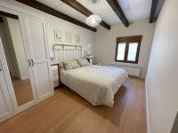 A bed or beds in a room at Casa Las Cabañas de Castilla VUT