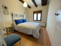 A bed or beds in a room at Casa Las Cabañas de Castilla VUT