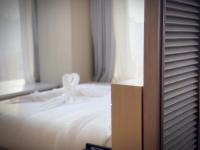 lyf Xi'an Dayanta by Ascott free gym & self-service free laundry roomにあるベッド