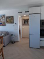 Kuchyň nebo kuchyňský kout v ubytování Precioso apartamento con piscina