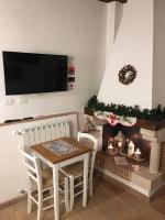A television and/or entertainment centre at Aurora Medieval House