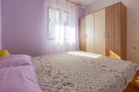 Posteľ alebo postele v izbe v ubytovaní Apartments FILIP