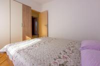 Posteľ alebo postele v izbe v ubytovaní Apartments FILIP