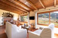 A television and/or entertainment centre at Home2Book Las Mimbreras