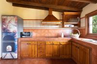 A kitchen or kitchenette at Home2Book Las Mimbreras