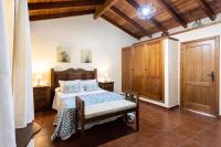 A bed or beds in a room at Home2Book Las Mimbreras