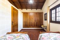 A bed or beds in a room at Home2Book Las Mimbreras