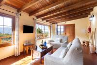 A television and/or entertainment centre at Home2Book Las Mimbreras