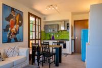 A kitchen or kitchenette at La Casa Sul Porto - Italian Homing