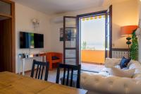 A television and/or entertainment centre at La Casa Sul Porto - Italian Homing