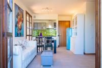 A kitchen or kitchenette at La Casa Sul Porto - Italian Homing