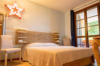 A bed or beds in a room at La Casa Sul Porto - Italian Homing